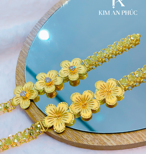 Lắc tay hoa vàng 980